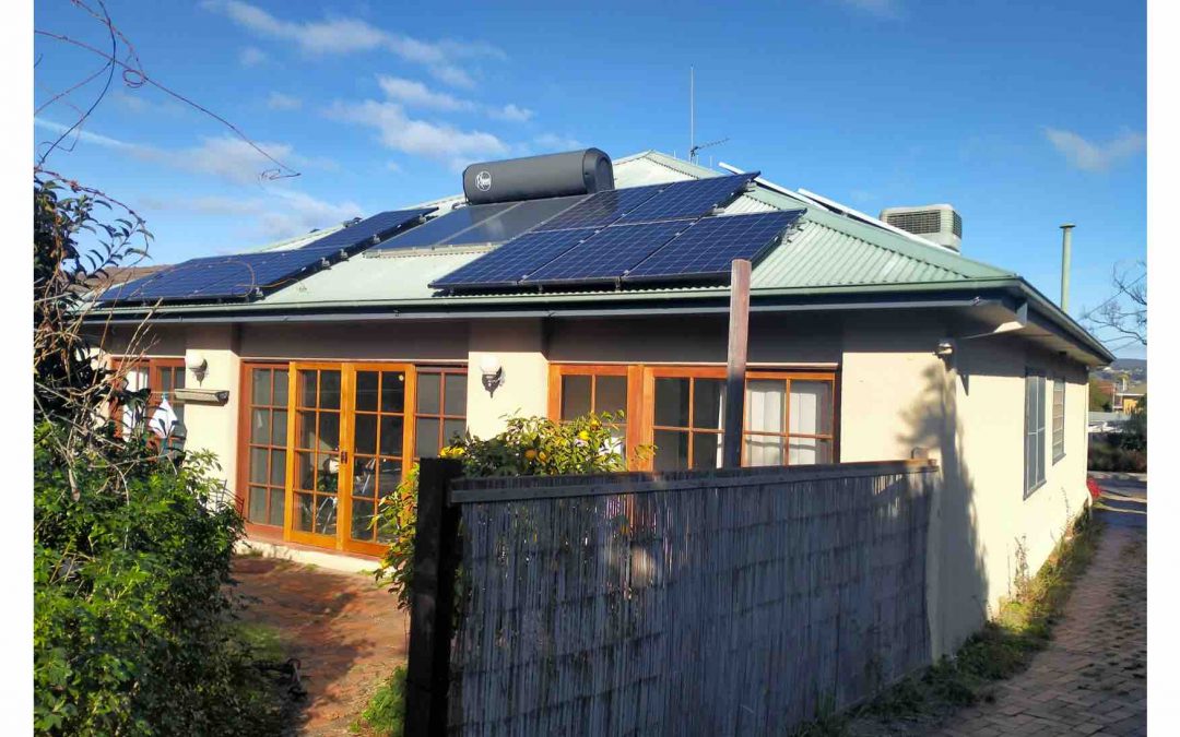Solar power and hot water on roof of house